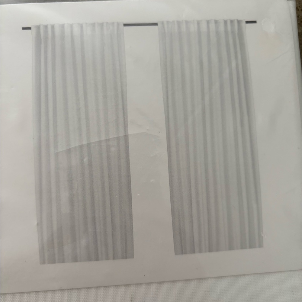 IKEA brand new white curtains. 1 set of 2
